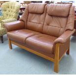 A modern brown faux hide upholstered two person cottage settee CA
