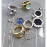 Three similar yellow/white metal plated Lalique coloured glass signet rings; a gold coloured metal,