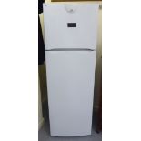 An Indesit 30/70 fridge/freezer 64''h 21.