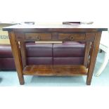 A modern mahogany two tier hall table with a pair of frieze drawers, raised on square,