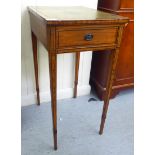 A late 19thC satin mahogany side table, the later hide inset top over a single drawer,