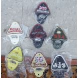 Six painted cast metal wall mounted bottle openers,