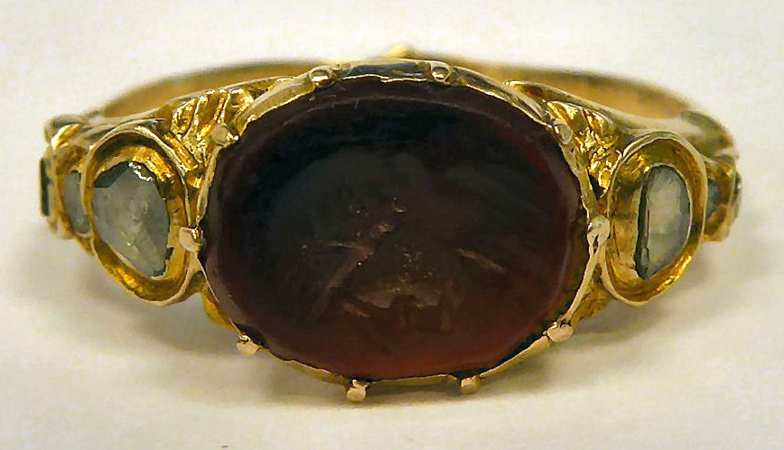 A gold coloured metal ring,