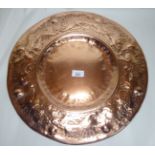 An Arts & Crafts period copper broad rimmed charger,