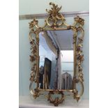A modern mirror, set in an antique inspired,