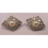 A pair of 18ct white gold, single pearl and diamond set,