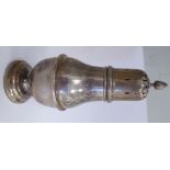 An Edwardian silver caster of pedestal vase design with a domed cover,