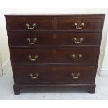 A George III crossbanded mahogany and oak dressing chest with two short/three long drawers,