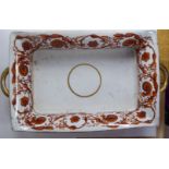 A mid 19thC Continental ivory glazed porcelain, twin handled dish, having rolled sides,
