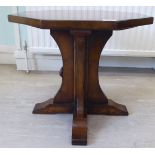A Robert Thompson 'Mouseman' burnished oak occasional table,