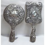 Two early 20thC Art Nouveau silver backed hand mirrors,