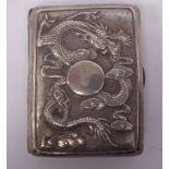 A Sino-European silver coloured metal folding cheroot case, cast,
