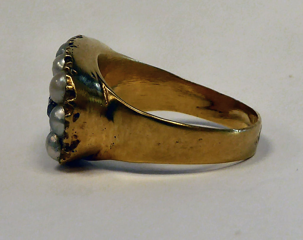A gold coloured metal ring, set with five diamonds, - Image 2 of 5