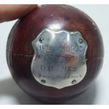 An early 20th stitched red hide cricket ball bears a silver plaque for Eastcote Cricket Club 9
