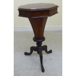 A late Victorian burr walnut and mahogany sewing table of octagonal, tapered form with a hinged lid,