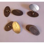 Two pairs of oval Sterling silver cufflinks with engine turned decoration