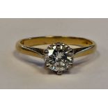 An 18ct gold claw set diamond solitaire ring