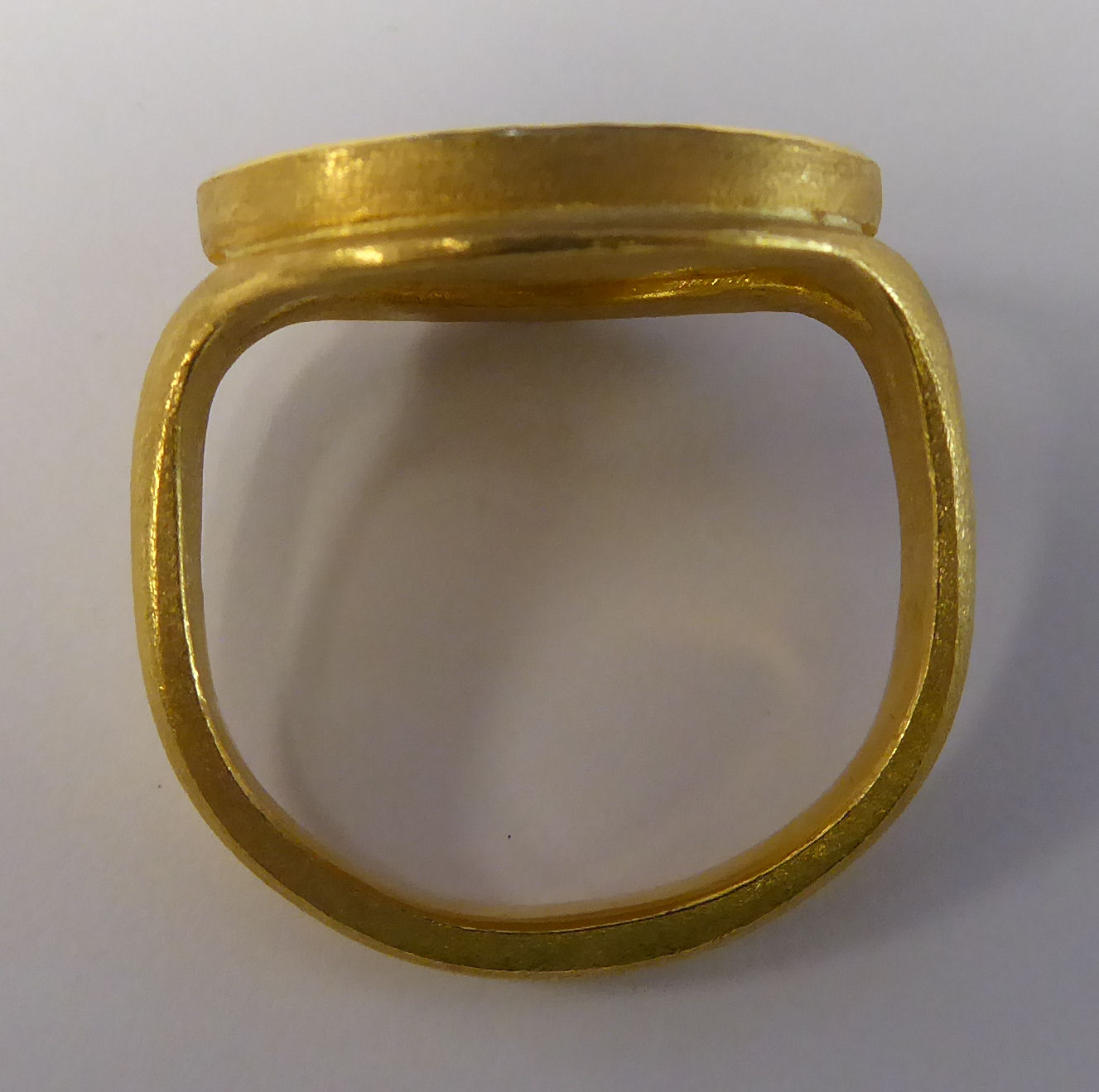 A gold coloured metal signet ring, - Image 4 of 5