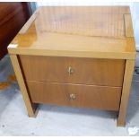 A modern Pierre Cardin mahogany finished two drawer bedside chest,