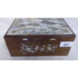 A late Victorian fruitwood jewellery box, the hinged lid decorated with a landscape,