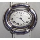 A lady's Bucherer oval, silver cased wristwatch, faced by a Roman dial,