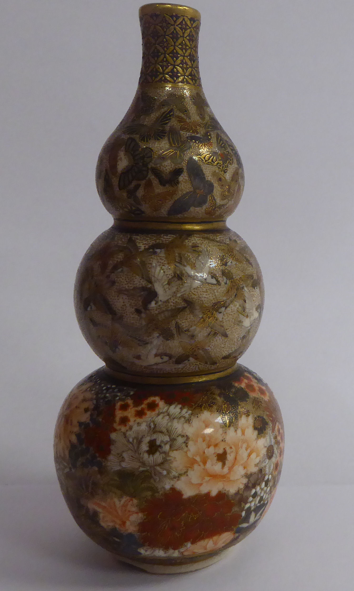 An early 20thC Satsuma earthenware triple gourd shaped vase,