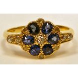 An 18ct gold rosette ring,