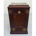 A late Victorian mahogany coal scuttle with applied brass mounts,