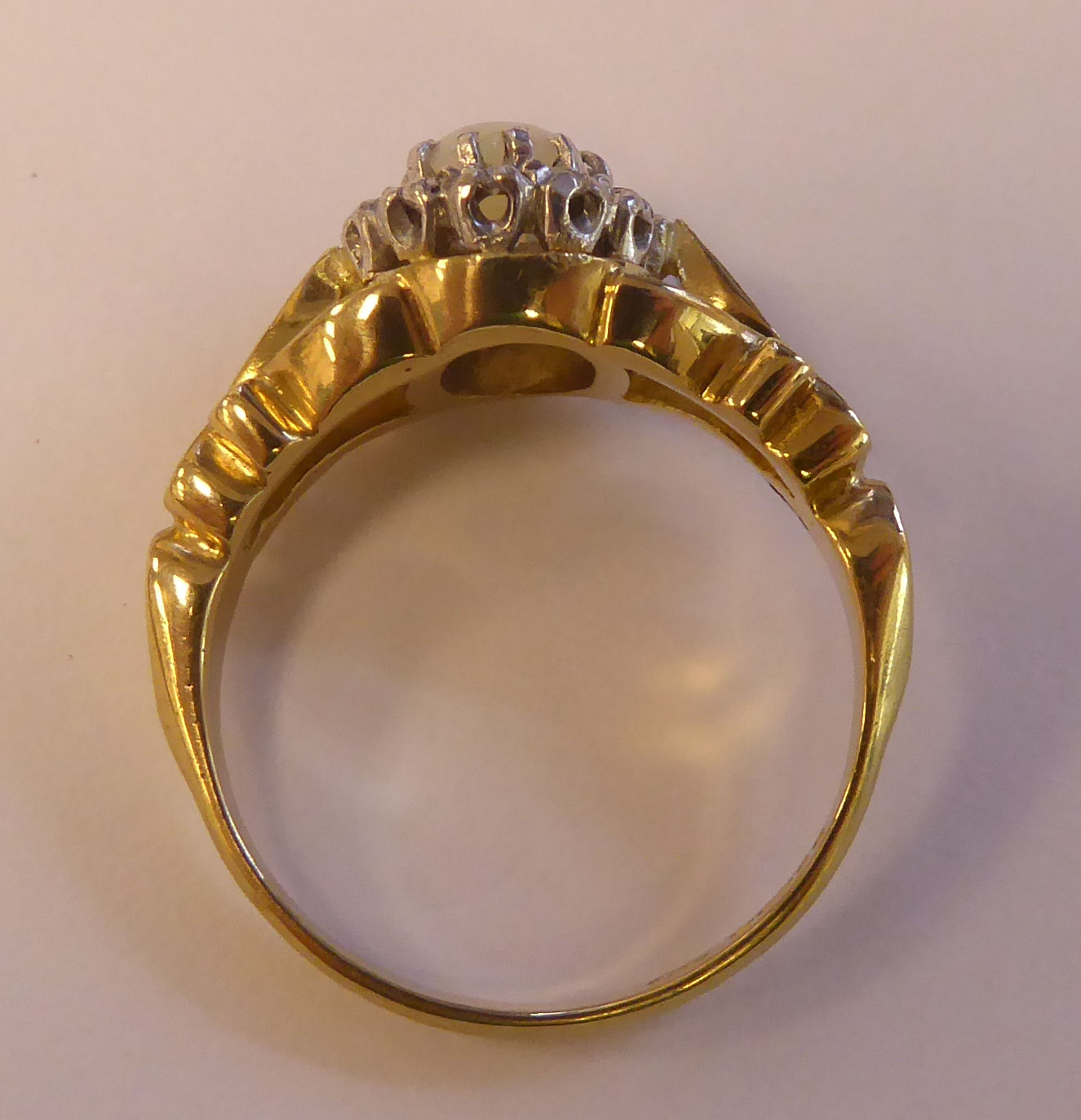 An 18ct gold ring, claw set with an opal, surrounded by diamonds, - Image 4 of 4
