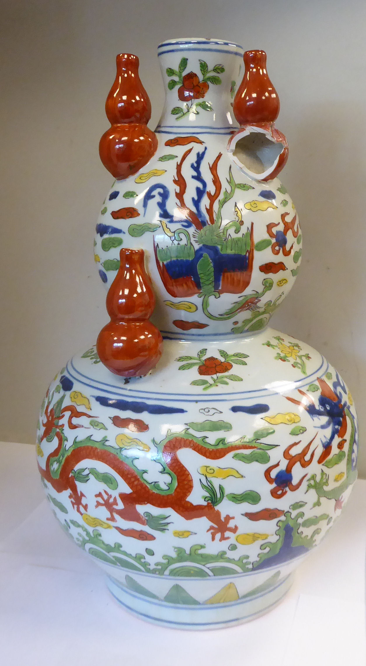 An early 20thC Japanese porcelain double gourd shaped vase, surmounted by five smaller vases, - Image 2 of 7