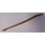 An 18ct gold wide, triple row, extended link bracelet,