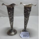 A pair of early 20thC Chinese Luen Wo silver specimen vases of pierced trumpet design,