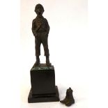 An early 20thC cast and patinated bronze figure,