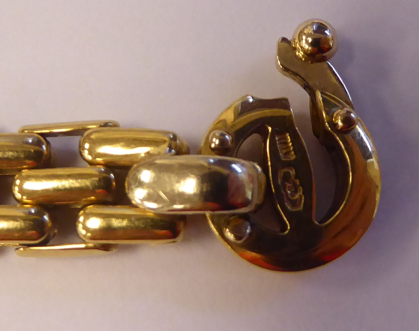 An 18ct gold wide, triple row, extended link bracelet, - Image 3 of 3