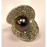 A Schoeffel white coloured gold diamond and Tahitian pearl set ring