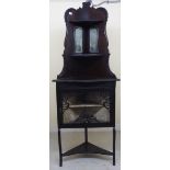 An Edwardian corner display unit, the superstructure with three tiered open shelves,