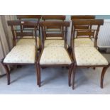 A set of six Regency mahogany framed dining chairs with ropetwist carved,