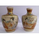 A pair of early 20thC Satsuma earthenware vases of shouldered baluster form,