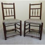 Two early 20thC stained beech and elm framed country style side chairs,