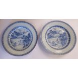 A pair of late 18thC Chinese porcelain plates, having raised, decoratively moulded borders,