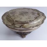 An Edwardian silver jewellery casket of ovoid bowl design,