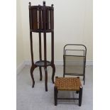 Small furniture: to include a mid 20thC lacquered brass and glazed magazine rack,