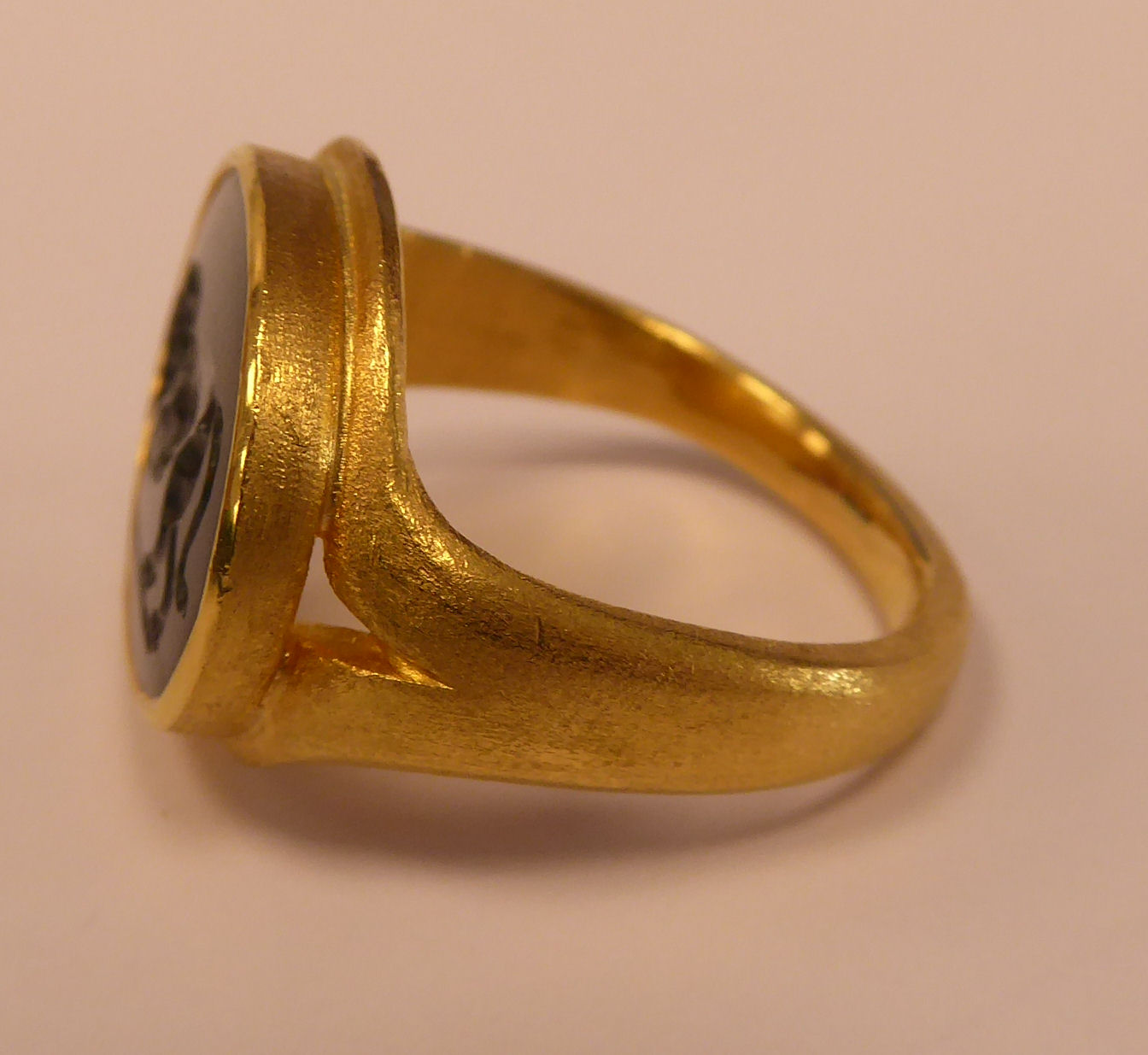 A gold coloured metal signet ring, - Image 2 of 5