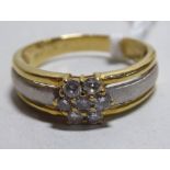 A bi-coloured 18ct gold ring,