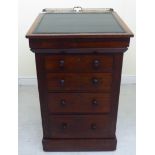 An early Victorian mahogany Davenport, having a brass galleried, hinged lid,