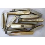 Seventeen similar 19th & 20thC folding fruit knives with mother-of-pearl handles and silver blades