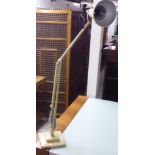 A cream painted metal Anglepoise style lamp RAM
