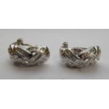 A pair of woven 18ct white gold earrings,