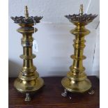 A pair of 19thC Dutch brass candlesticks (later converted to electricity),