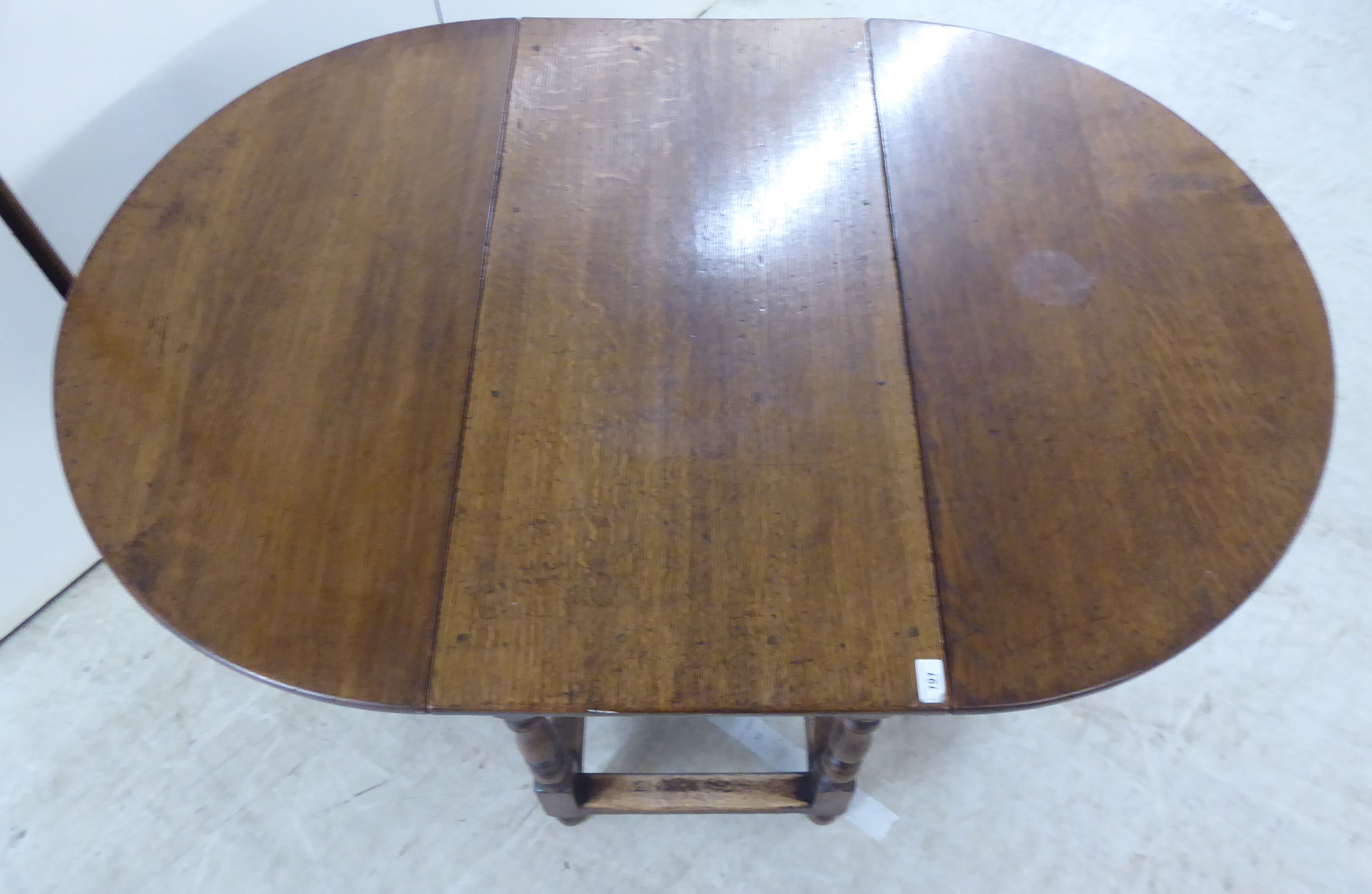 A modern Jacobean design oak dining table with fall flaps, - Image 3 of 3